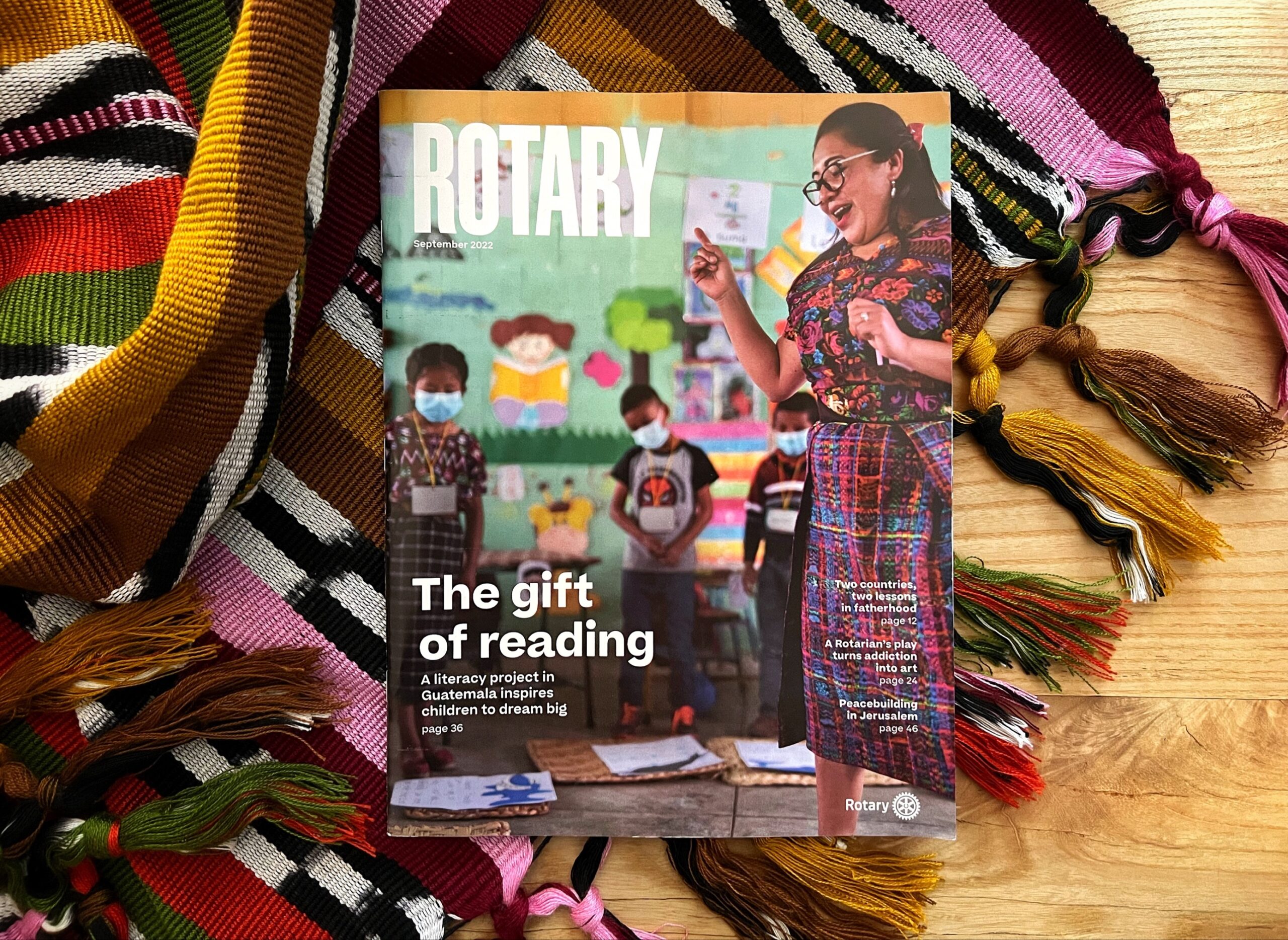 Rotary Magazine Cover Flat Lay with Tapestry Photo